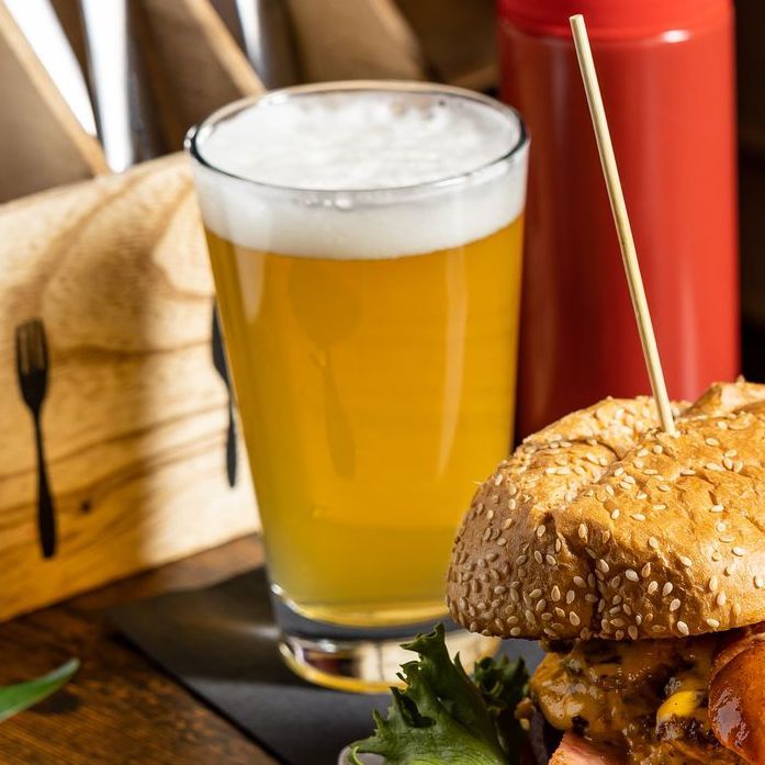 a burger and a beer close up at tony tenderonis in downtown denver colorado
