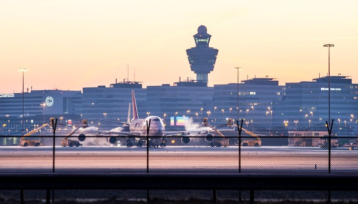 Kan ik een Taxi vanaf Schiphol boeken met een vaste prijs?