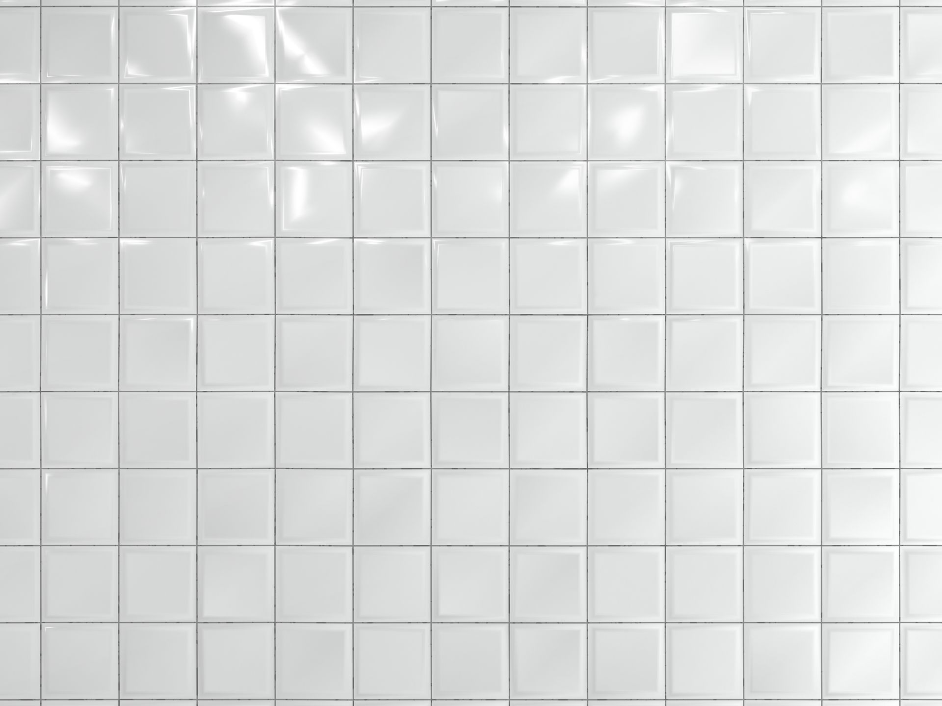 White ceramic tiled wall with a light gray grid pattern and subtle reflections