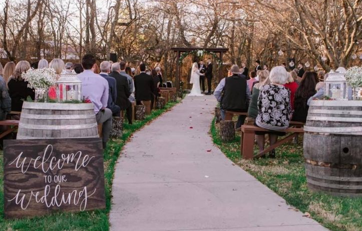 A bride and groom are getting married at a wedding ceremony.