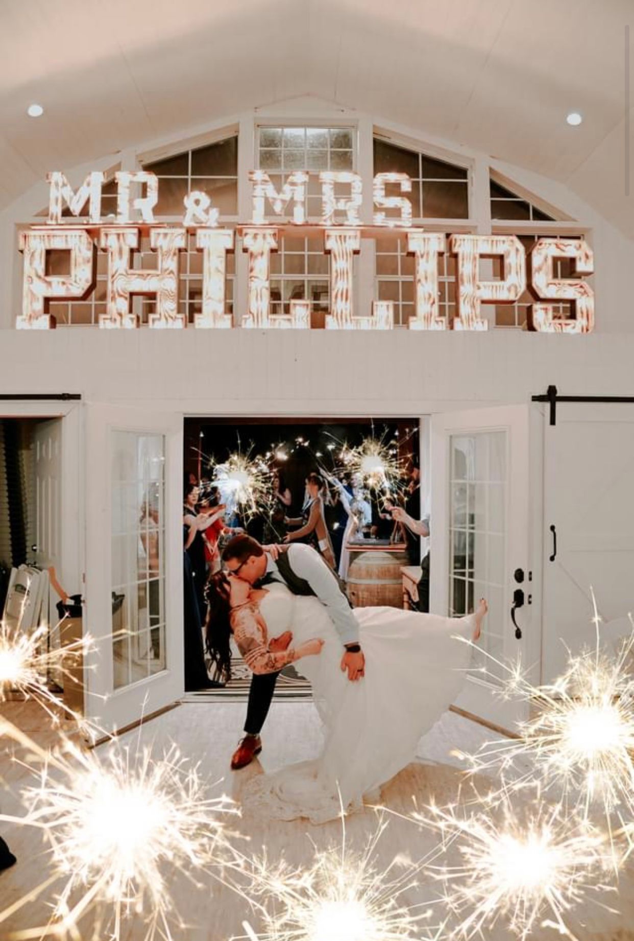 Bride and groom dance beneath a