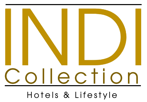 Logo del Conchigliazzurra Resort & Beach: conchiglia grigia sopra il testo.