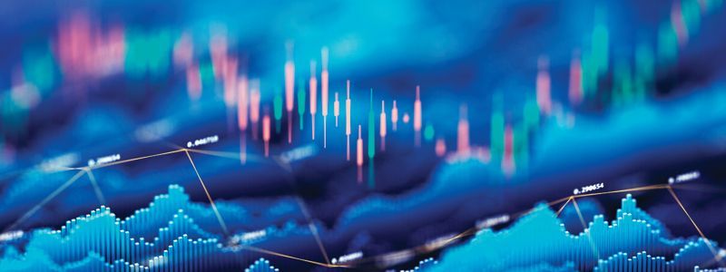 Stock market trading chart with blue and pink data lines.