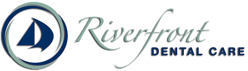 Riverfront Dental Care logo: sailboat inside a circle, with script "Riverfront" and "DENTAL CARE".