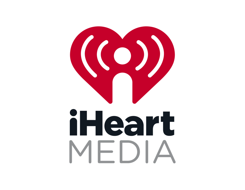 IHeartMedia logo with red heart-and-radio icon above black and gray text