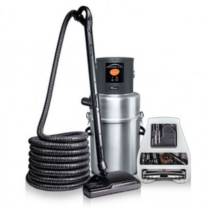 Silver commercial carpet cleaner with black hose, wand, floor head, and accessory tools on a white background