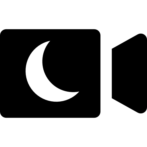 A camera with a crescent moon on it free icon