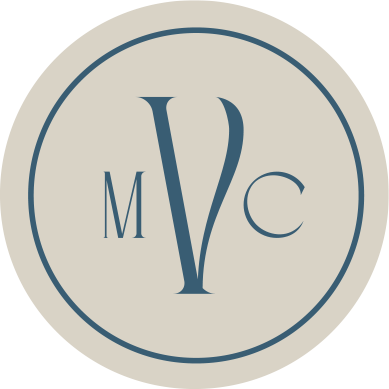 A circle with the letter m and c inside of it
