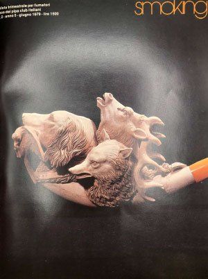 Un'immagine di una pipa con tre animali sopra