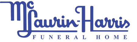 Blue logo for McLaurin-Harris Funeral Home with stylized text over a horizontal line.