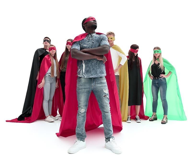 Group of people in superhero costumes, leader in red cape and mask.