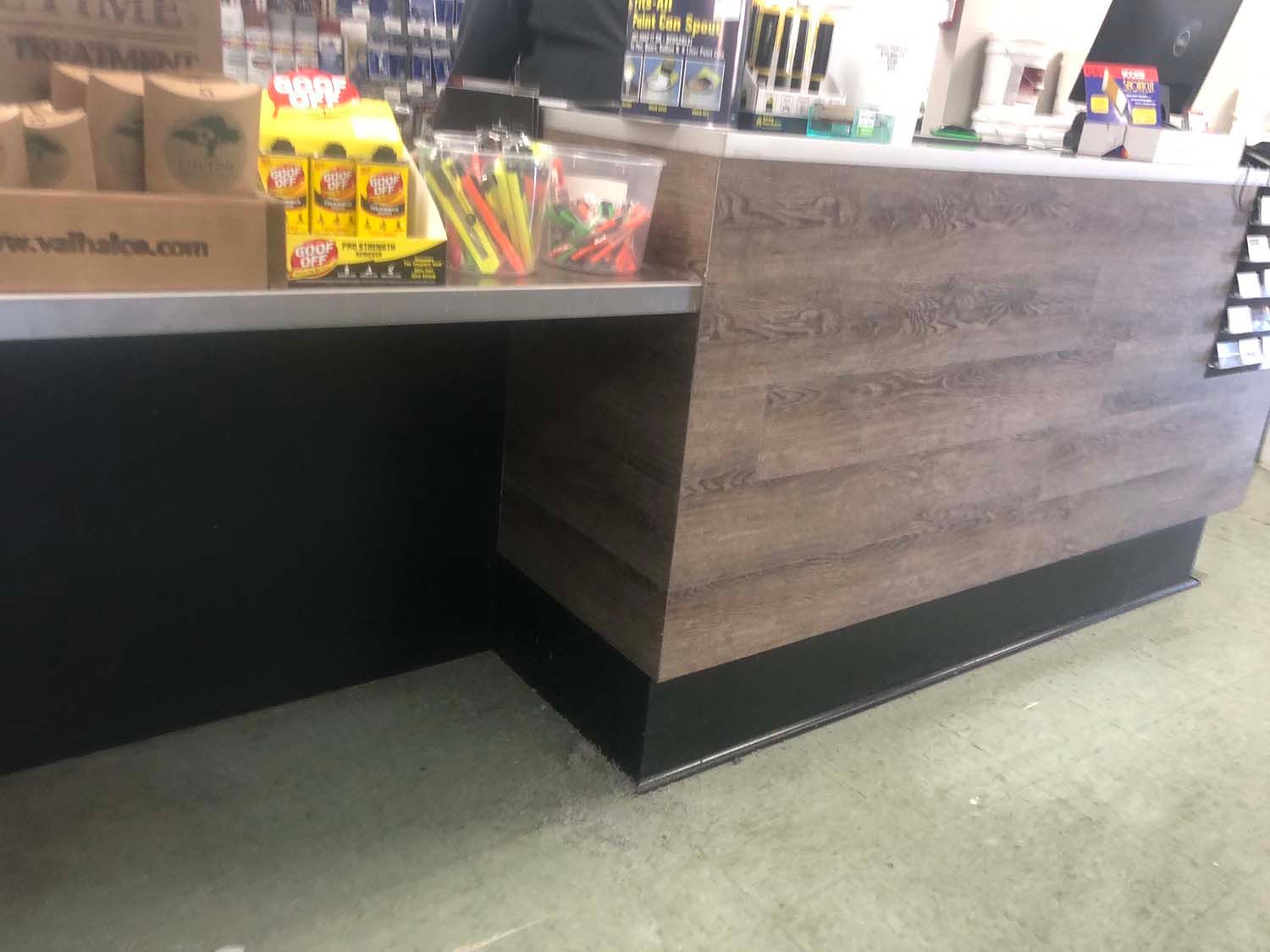 Convenience store checkout counter with snacks and drinks on display