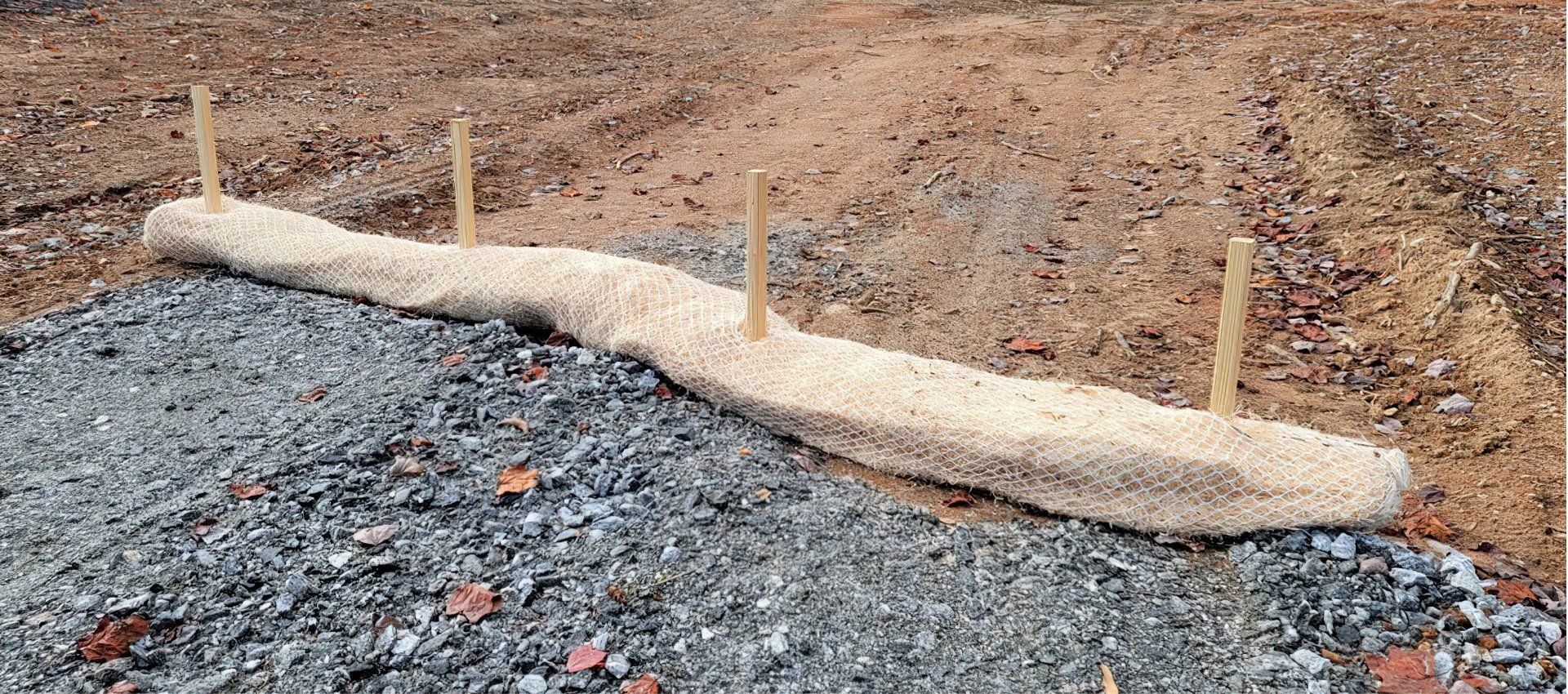 erosion and sediment straw wattle stakes