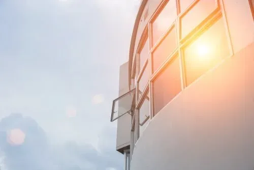 The Sun Is Shining Through The Windows Of A Building — Nambucca Glass in Nambucca Heads, NSW