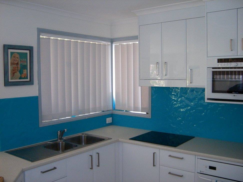 A Kitchen With White Cabinets And Blue Counter Tops — Nambucca Glass in Nambucca Heads, NSW