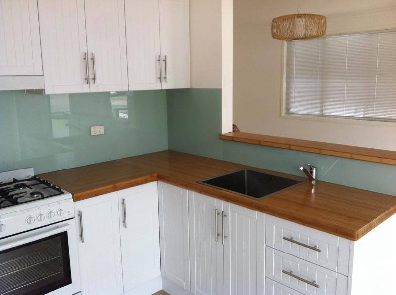 A Kitchen With White Cabinets And A Sink — Nambucca Glass in Nambucca Heads, NSW