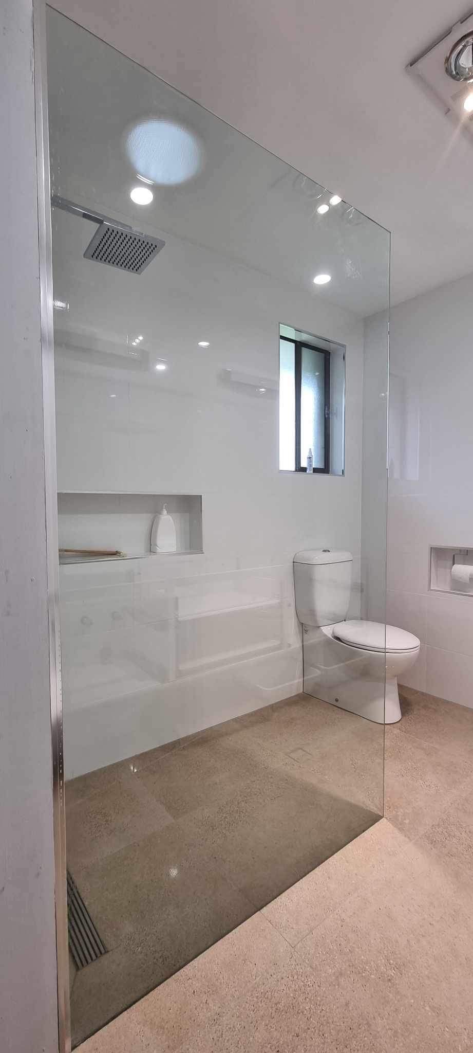 A Bathroom With A Walk In Shower , Toilet And Bathtub — Nambucca Glass in Nambucca Heads, NSW