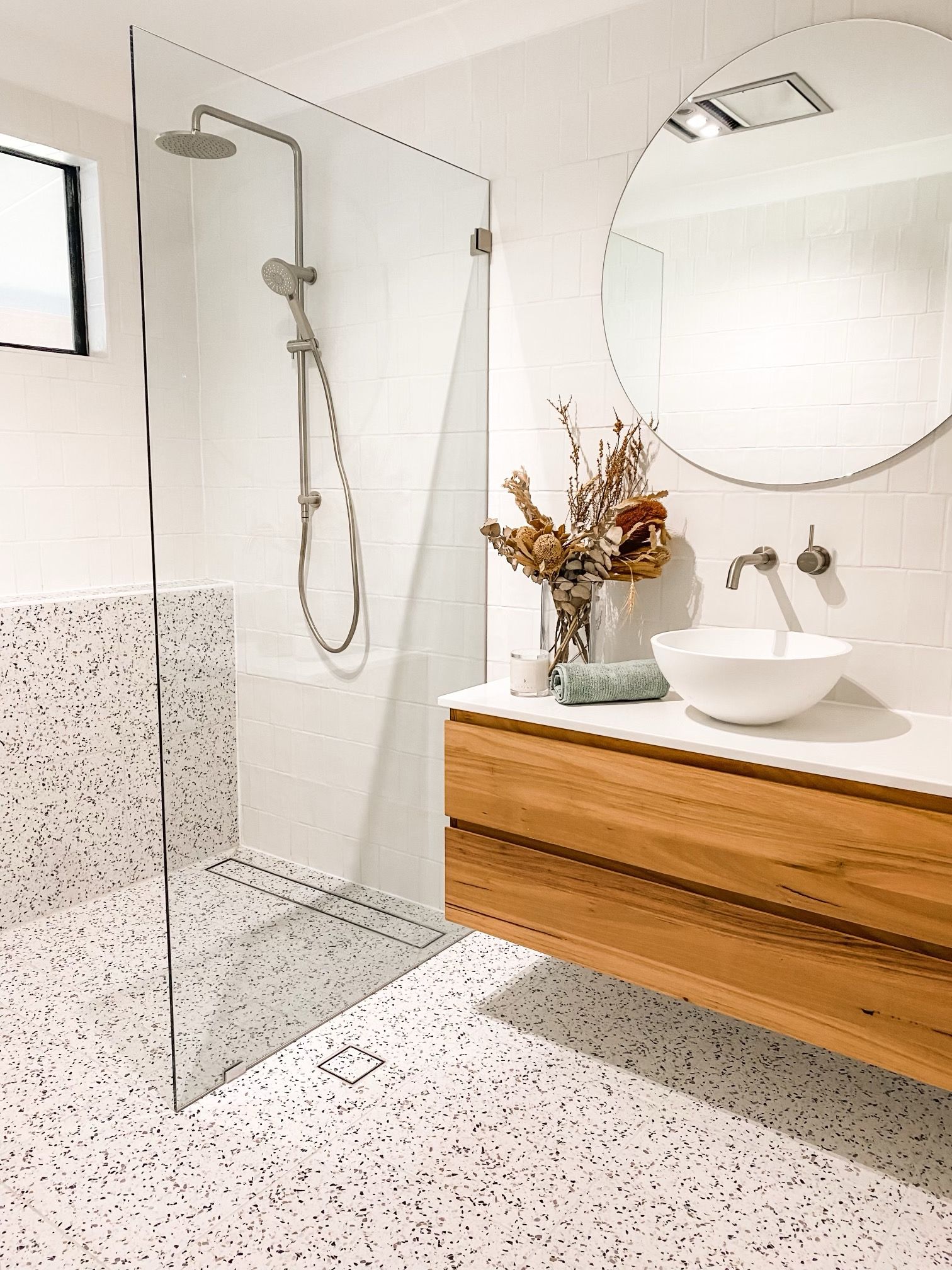 A Bathroom With A Walk In Shower , Sink And Mirror — Nambucca Glass in Nambucca Heads, NSW
