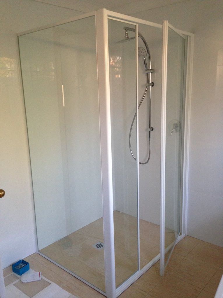 A Bathroom With A Shower Stall And A Shower Head — Nambucca Glass in Nambucca Heads, NSW