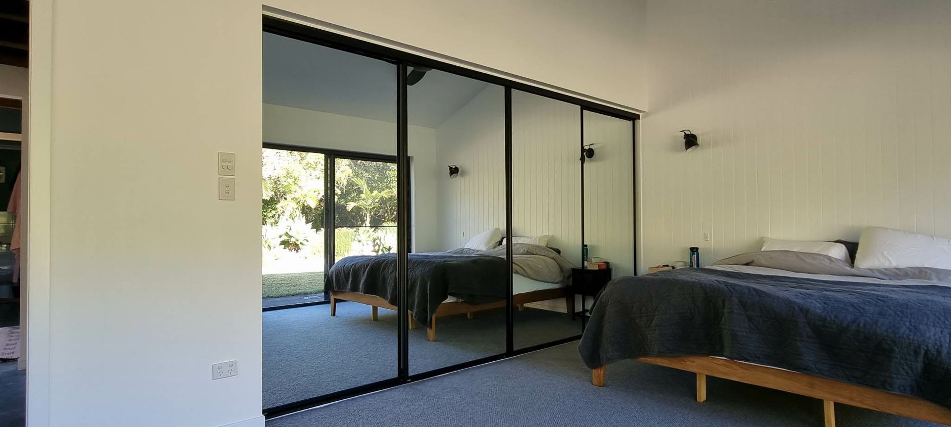 Bright Bedroom With Mirrored Closet Doors — Nambucca Glass in Nambucca Heads, NSW