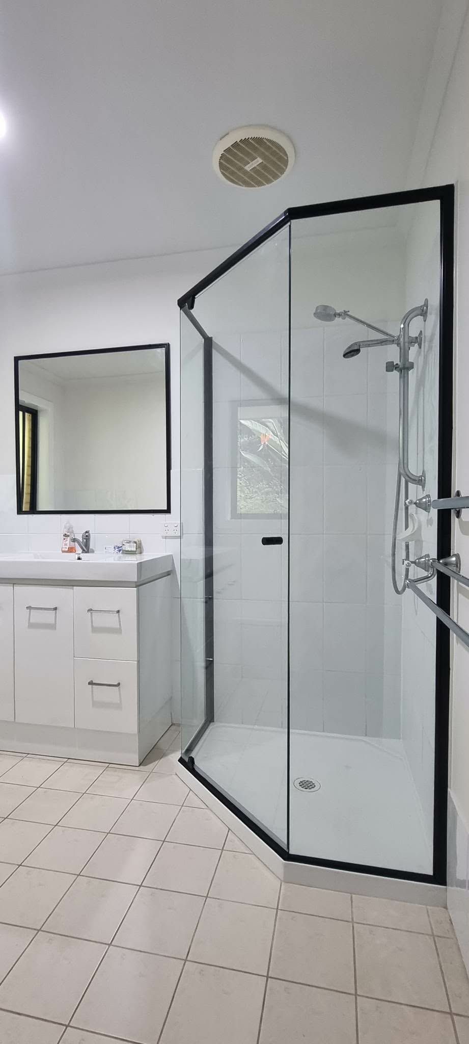 Bathroom With White Tile Floor, Vanity Sink, and Glass Shower — Nambucca Glass in Nambucca Heads, NSW