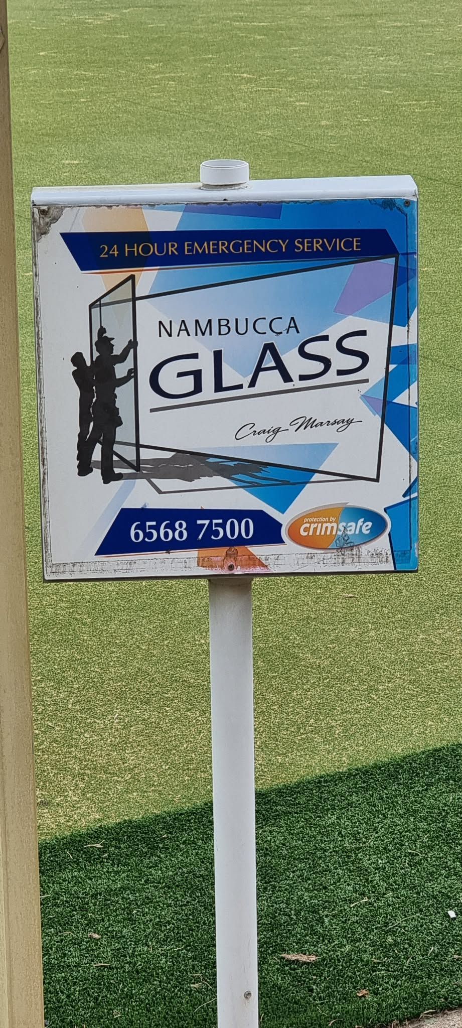 Blue and White Glass Recycling Bin Sign on A Post Outdoors — Nambucca Glass in Nambucca Heads, NSW