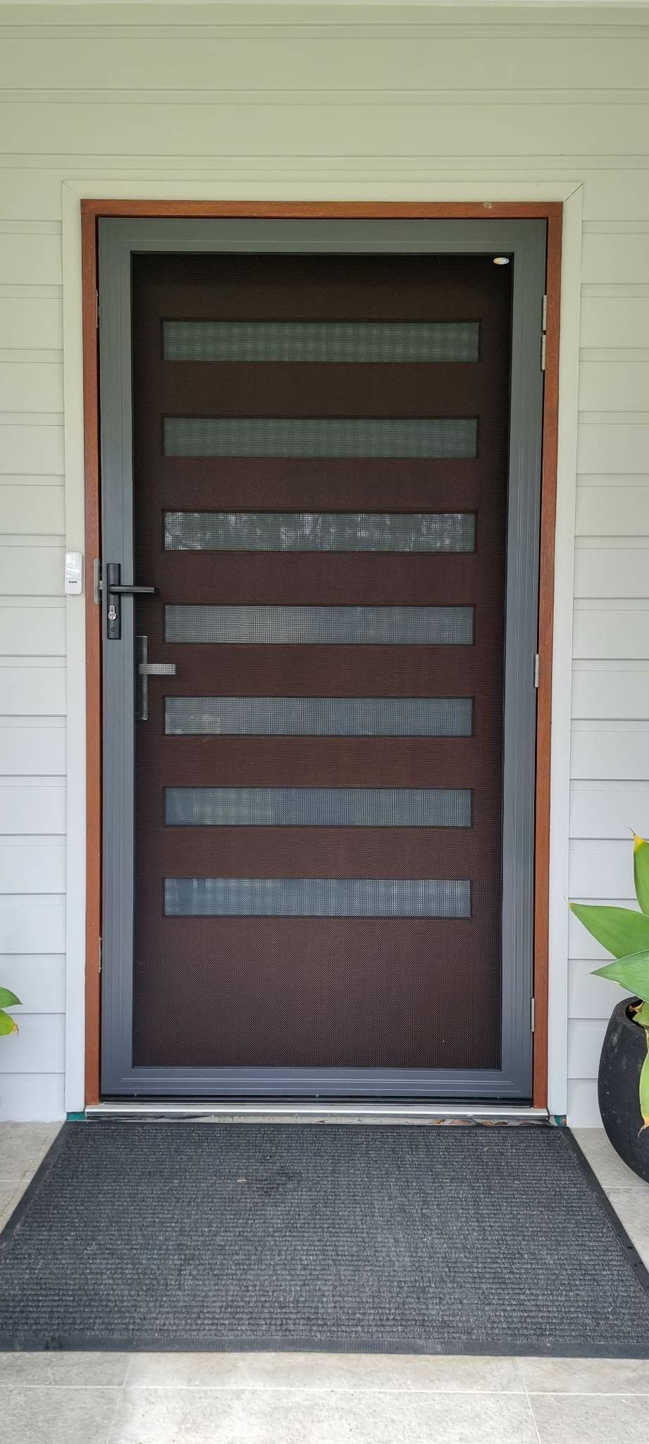 Front Entrance with A Dark Brown Security Door — Nambucca Glass in Nambucca Heads, NSW
