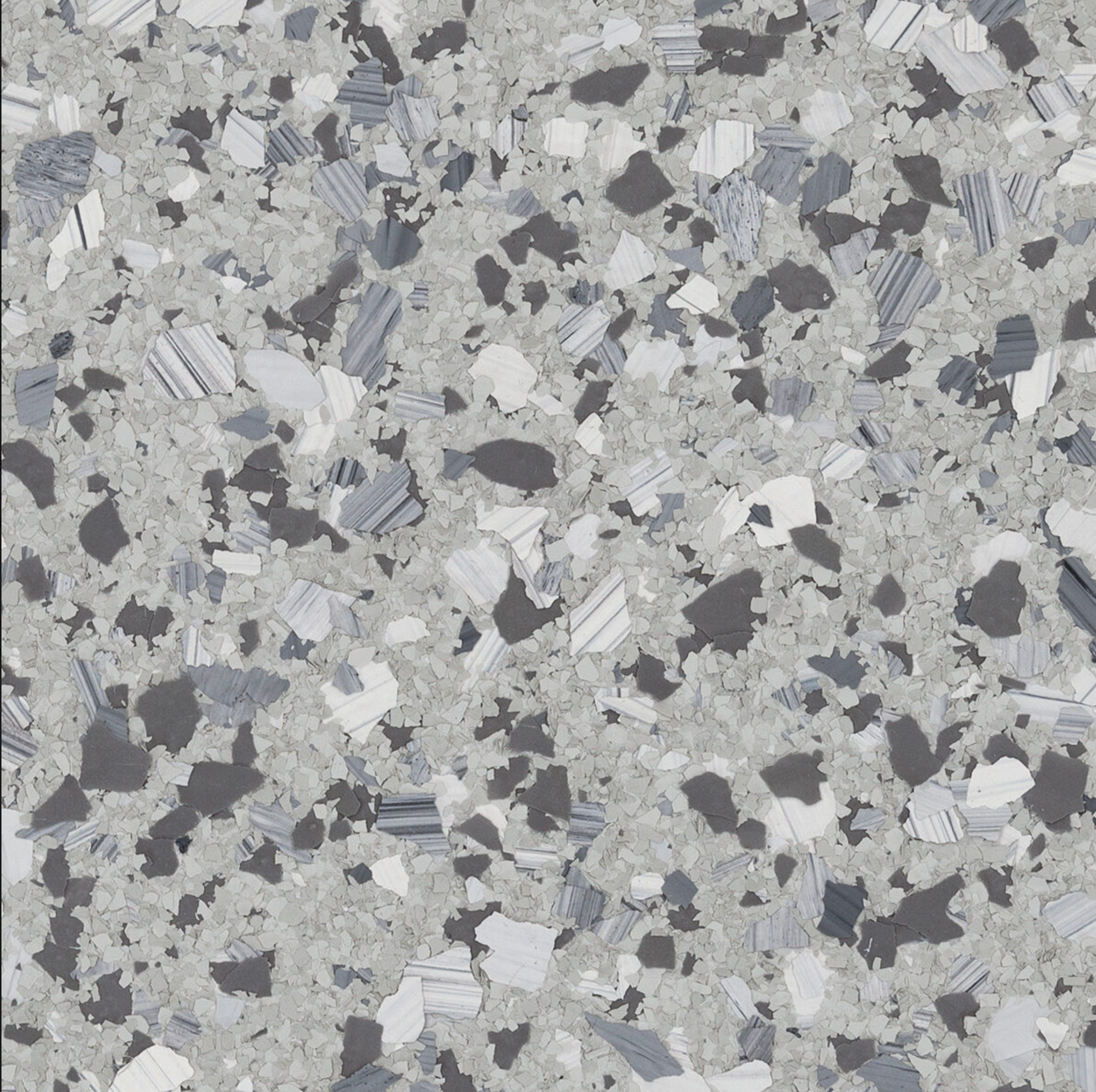 Un gros plan d'une texture de granit gris et noir
