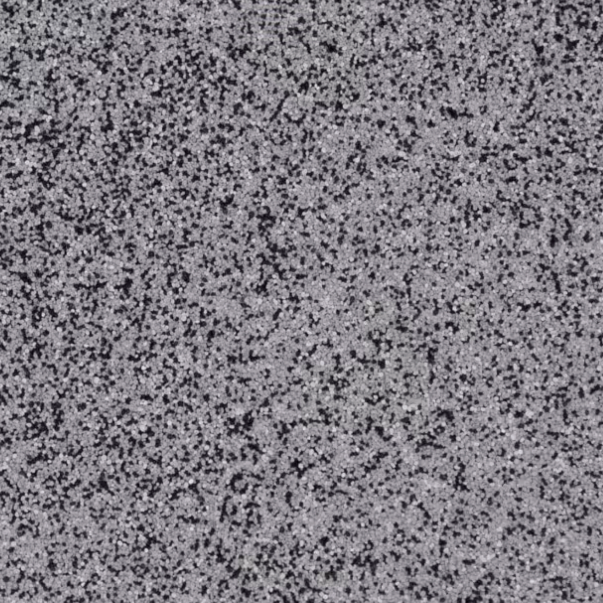 Gray granite-like textured surface with black specks.