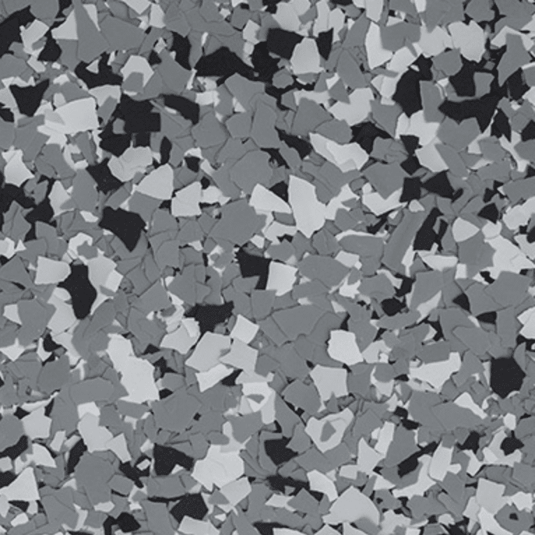 Un gros plan d'un motif de camouflage gris, blanc et noir.