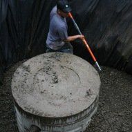 Worker Cleaning the Drainage — Putnam Valley, NY — B & B Landscaping & Gardening Inc.