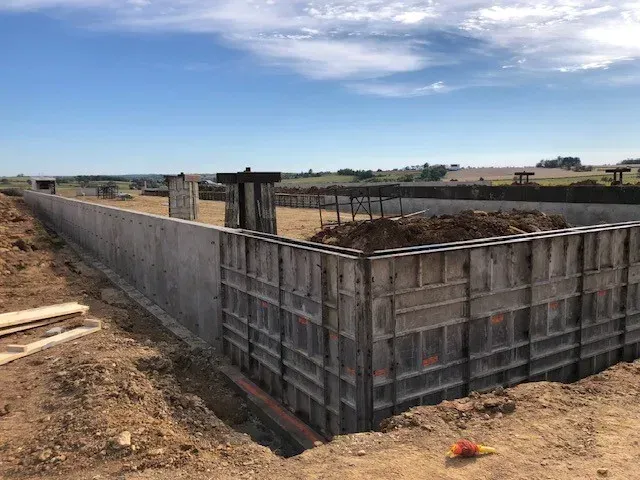 Concrete wall forms set in place for a new building foundation in Platteville, WI