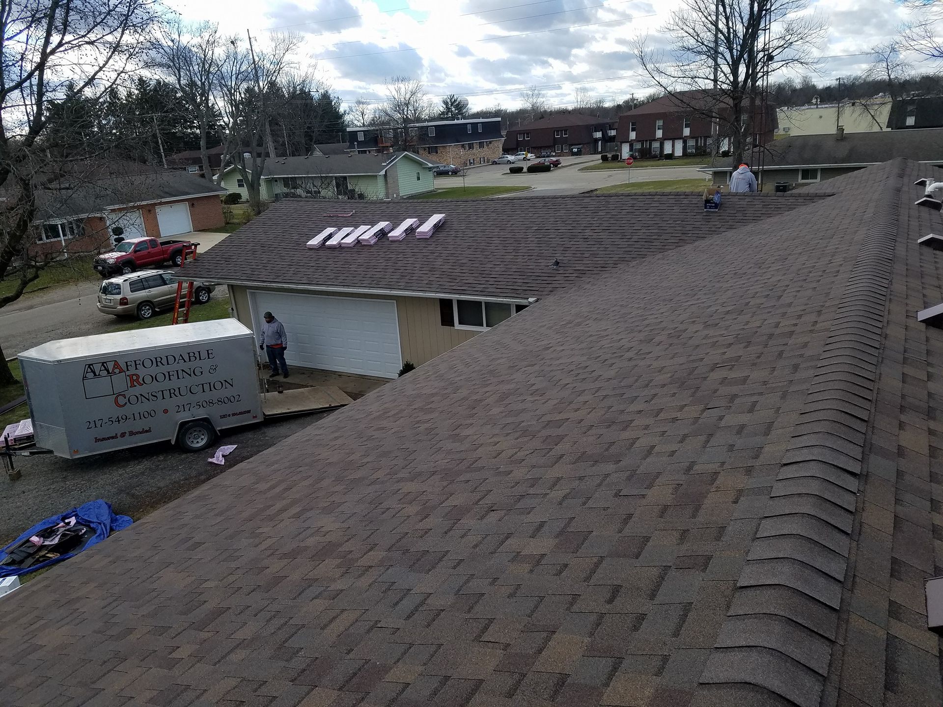 A house with a roof that is being repaired.