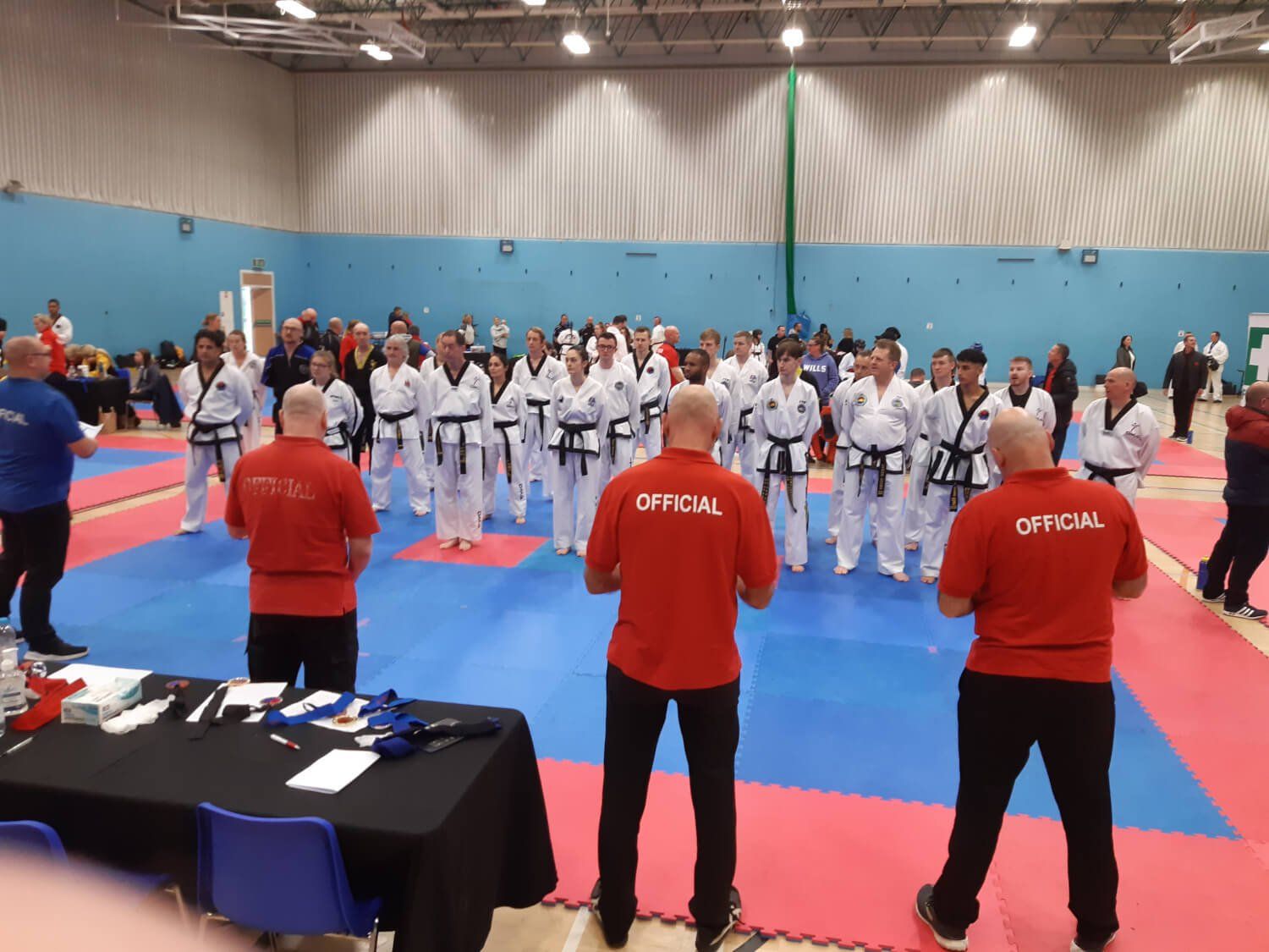 black belt patterns competitors lined up