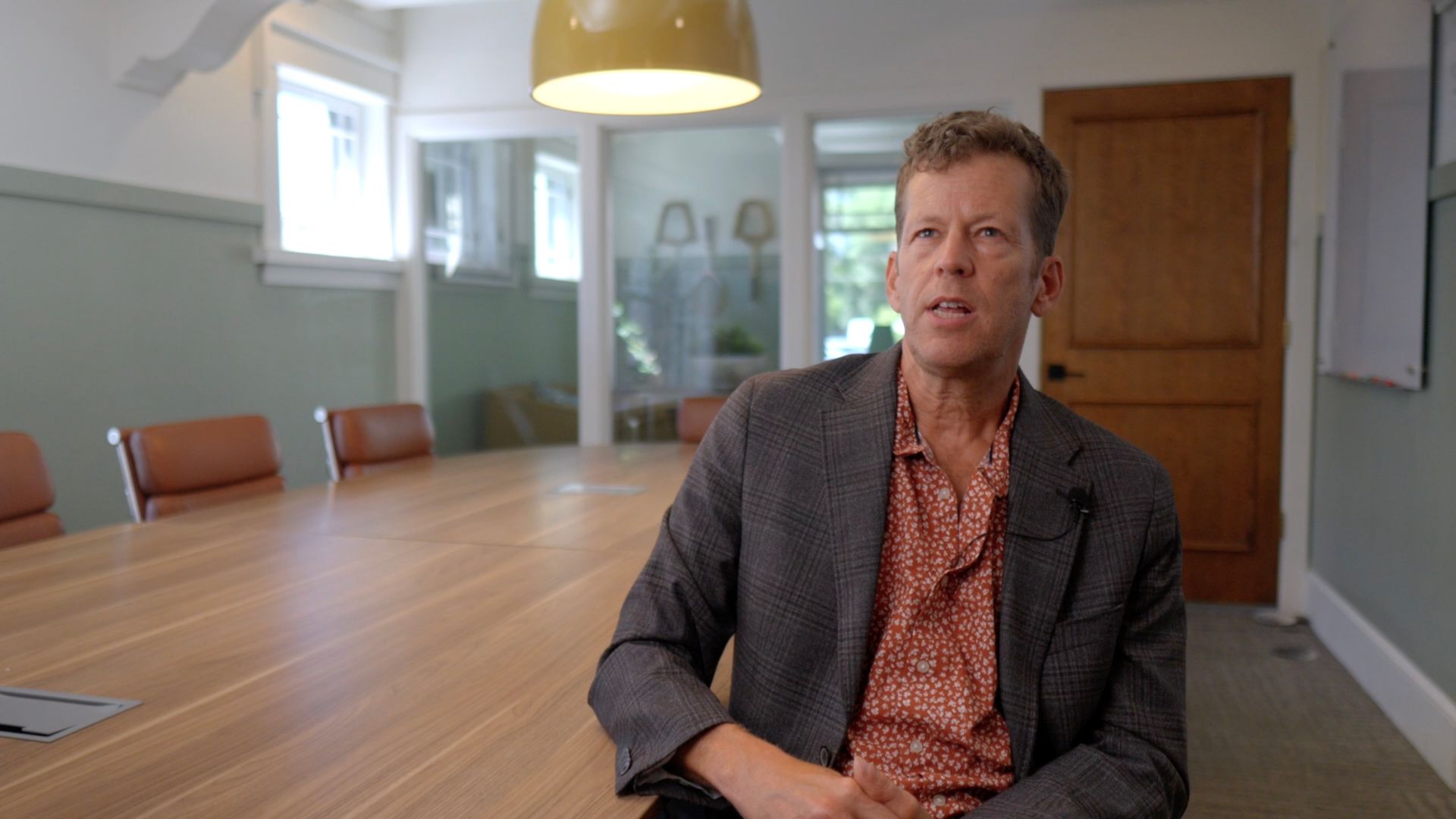 Biotech CEO discussing rare disease treatment