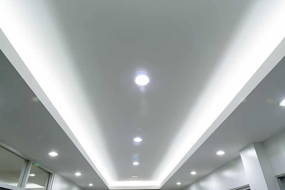 A White Ceiling With A Lot Of Lights On It — Reef Electrical in Cannonvale, QLD