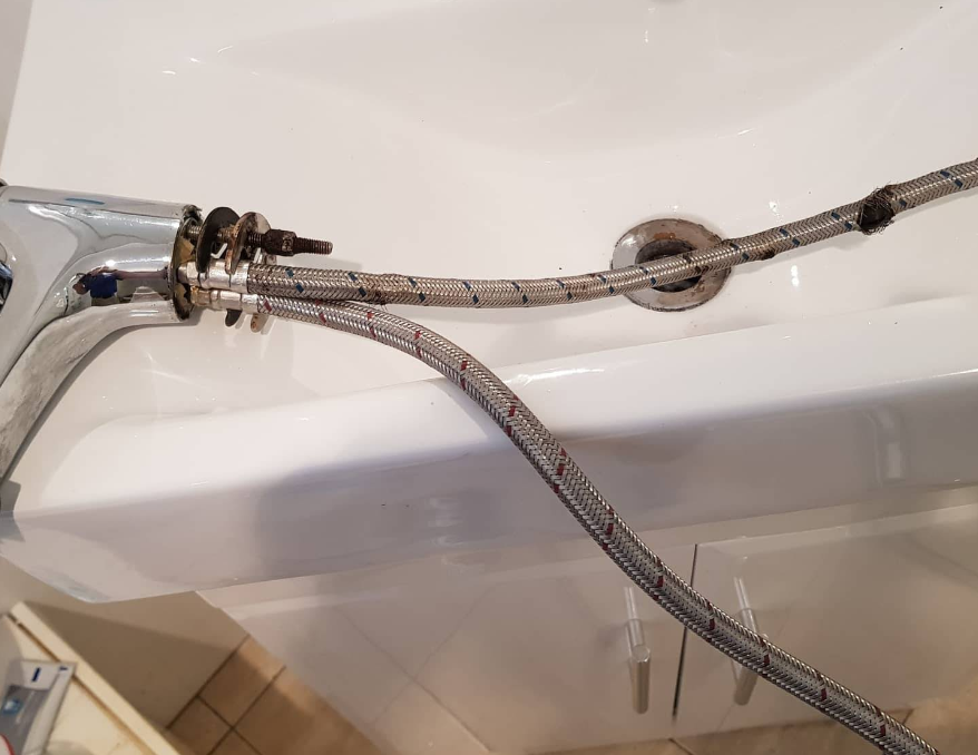 Two Braided Metal Hoses Attached to a Chrome Faucet — Jobs2BDone in Pearl Beach, NSW