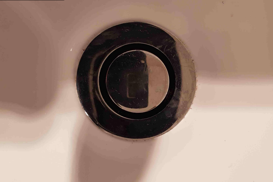 A close up of a drain hole in a bathroom sink. — Jobs2BDone in Bensville, NSW