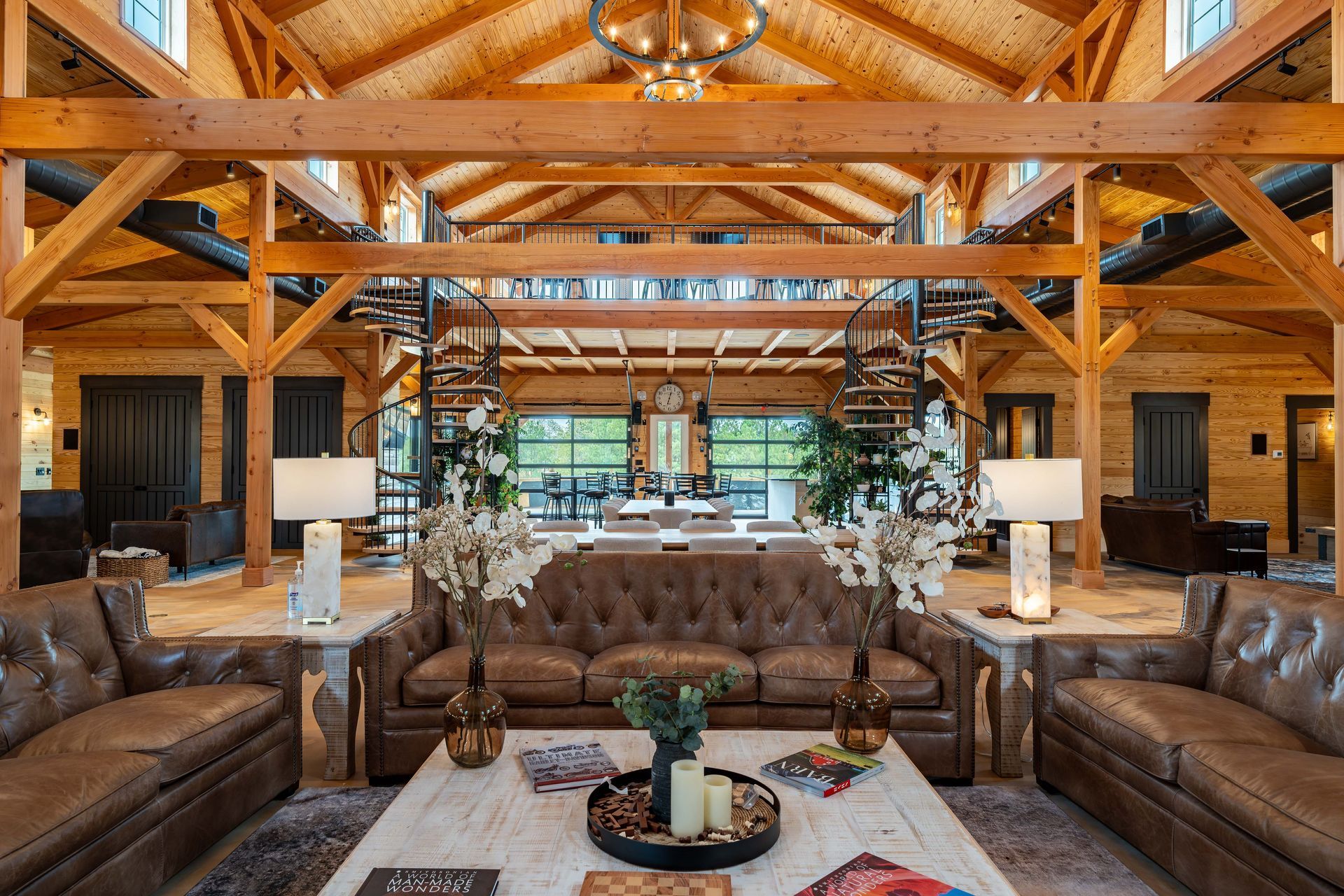 A living room filled with furniture and a wooden ceiling.