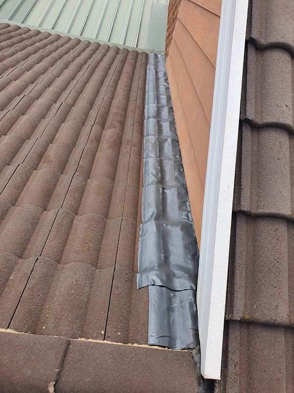 Leak Protection Layer Is Applied To A Roof Corners — ACT Roofing in Ngunnawal, ACT