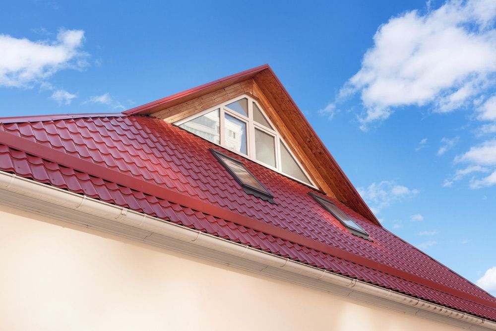 Red Metal Tiled Roof With New Dormer — ACT Roofing in Tuggeranong, ACT