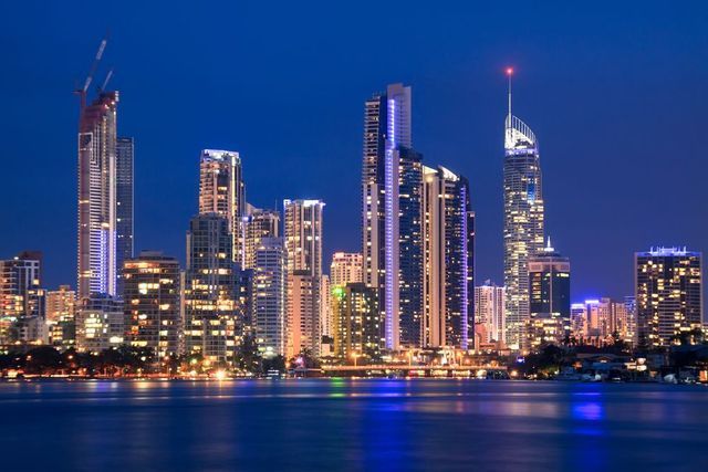 City Skyline at Dusk With Illuminated Skyscrapers — J & B Bus and Coach Pty Ltd In Gold Coast, QLD