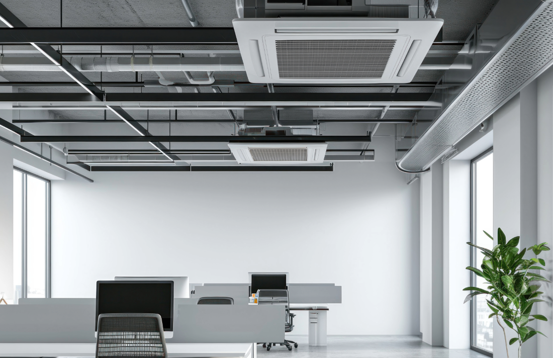 An office with a lot of windows and a ceiling fan.