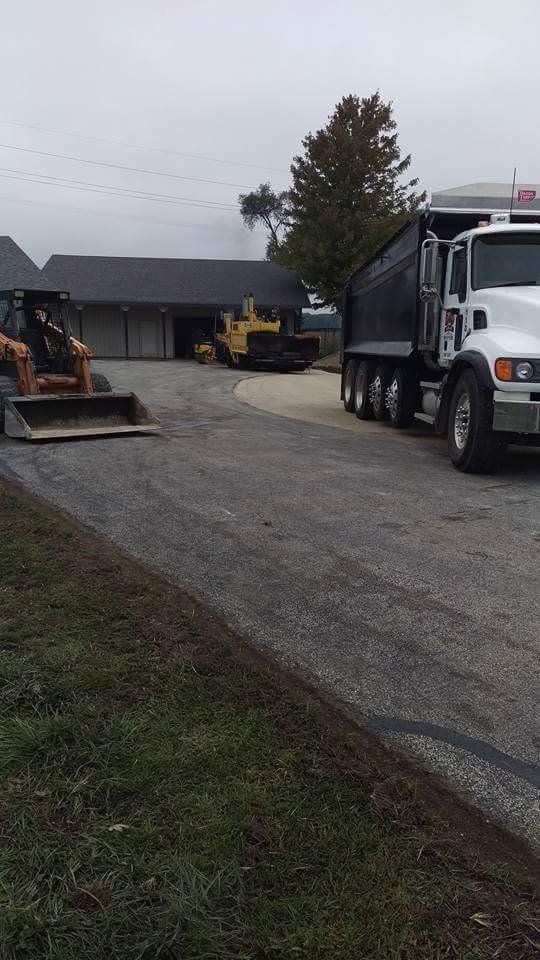 D&D Paving Inc. Service Truck and Tractors — Northwood, OH — D & D Paving Inc.
