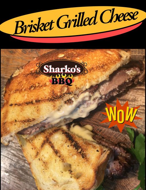 Sharko’s BBQ brisket grilled cheese sandwich with melted cheese and “Wow” text on a black background