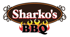 Sharko’s BBQ logo in red and black with flames behind the word “BBQ”