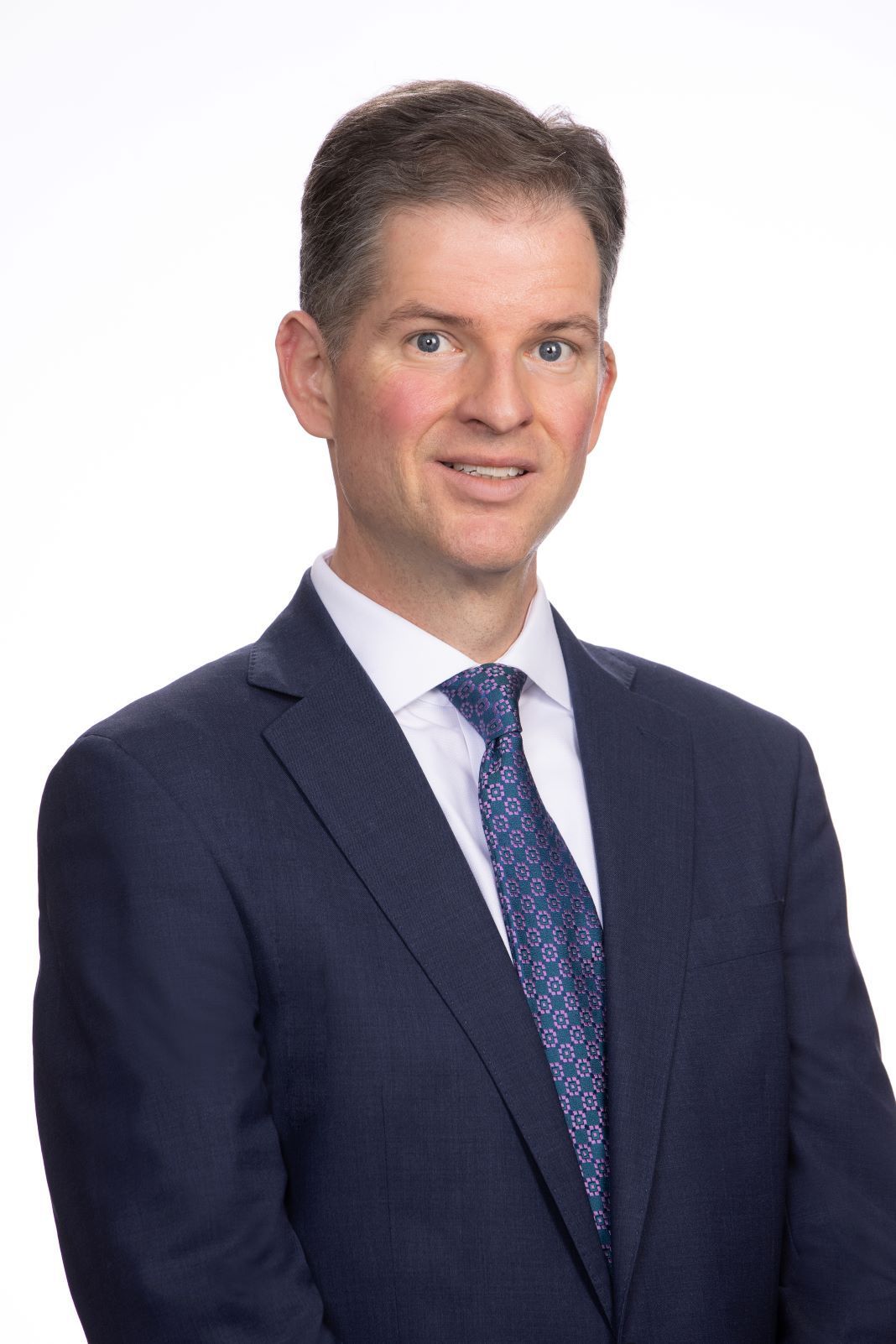 kevin gaughen jr photo wearing dark suit and tie with white shirt