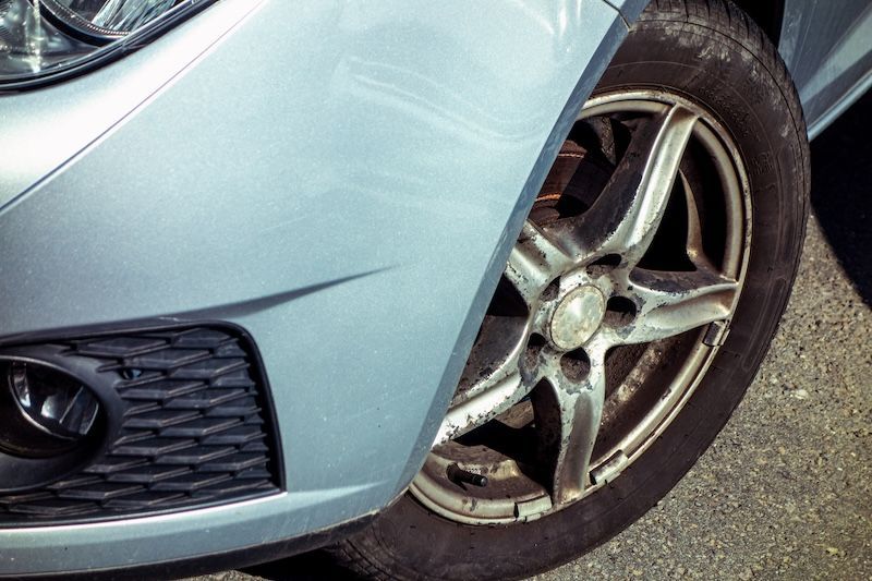 Front corner of a car with a black dust | Dave's Automotive in Stockertown, PA