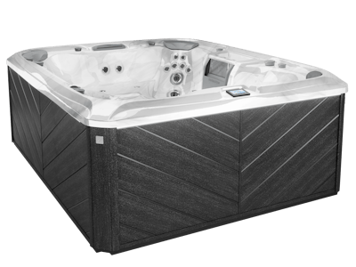 Hot tub with dark gray diagonal paneling, gray interior, and jets.