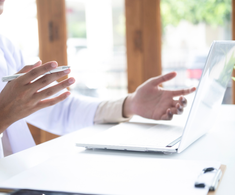 Meraki telehealth woman working at a laptop